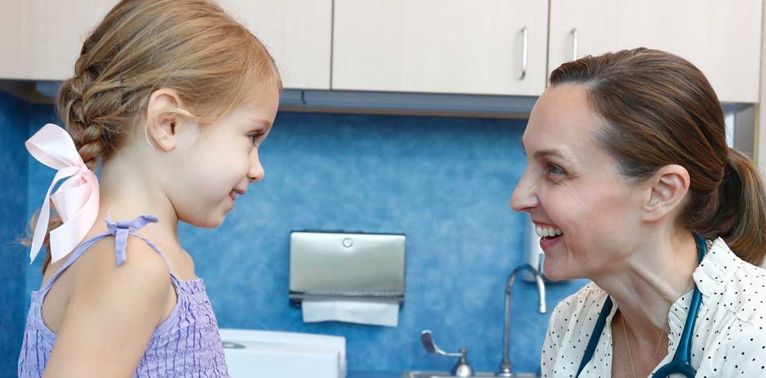 Doctor with girl patient